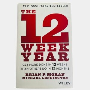 The 12 Week Year by Brian P. Moran - White & Red Cover Business Strategy Book